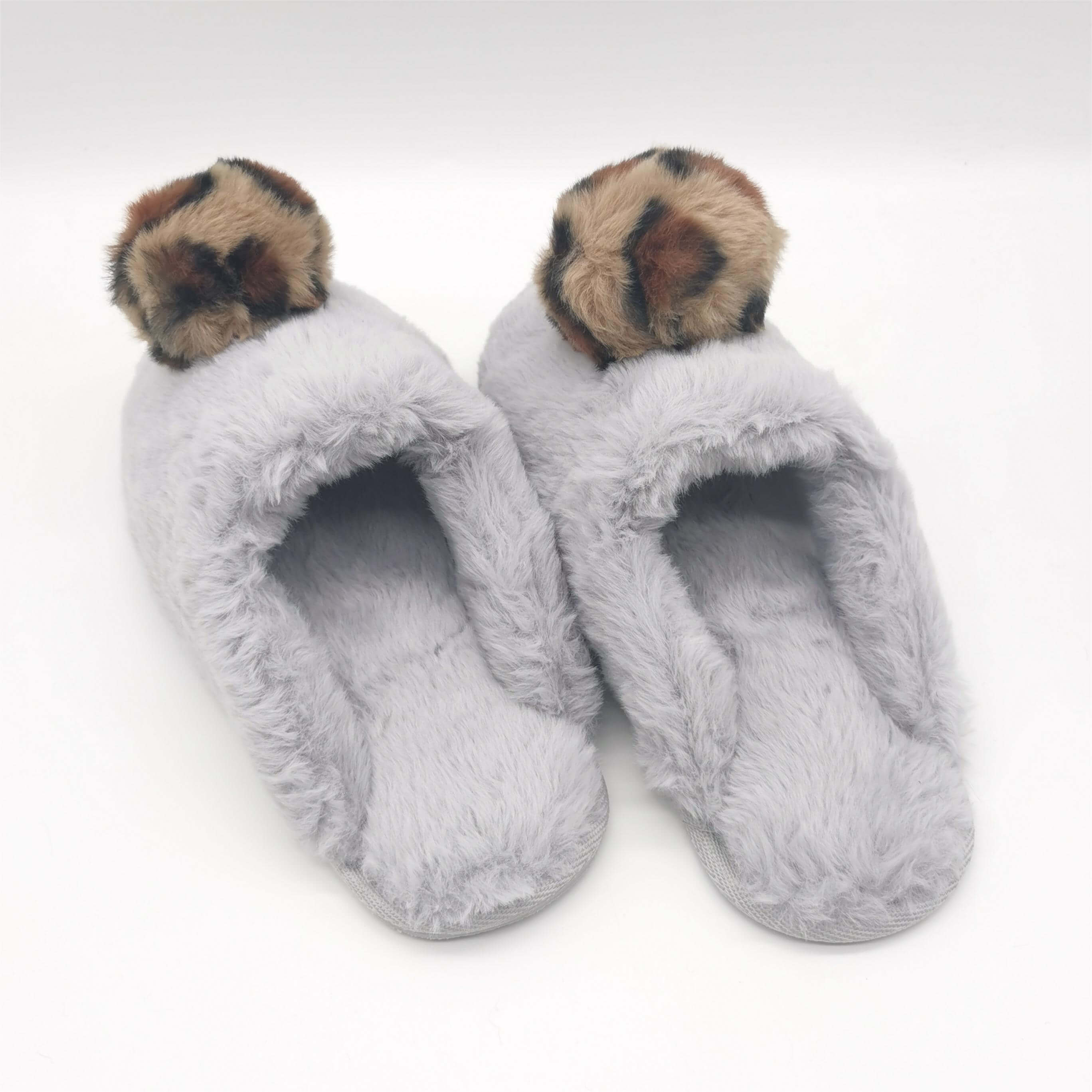 Women's faux rabbit fur upper with poms