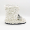 Embossed faux fur upper with poms boot for women