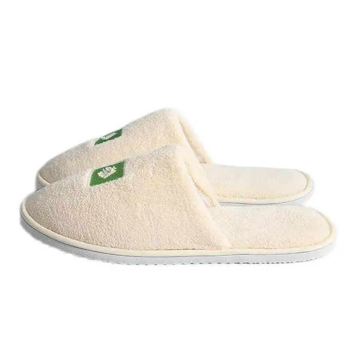 Light yellow monogram embroidered logo hotel slippers