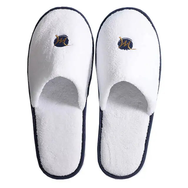 White cozy coral fleece disposable hotel slippers